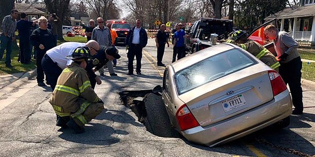 A car ended up in a large sinkhole in northwest Indiana on Wednesday.