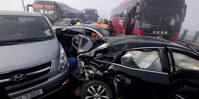 Feb. 11, 2015: Damaged vehicles sit on Yeongjong Bridge in Incheon, South Korea.