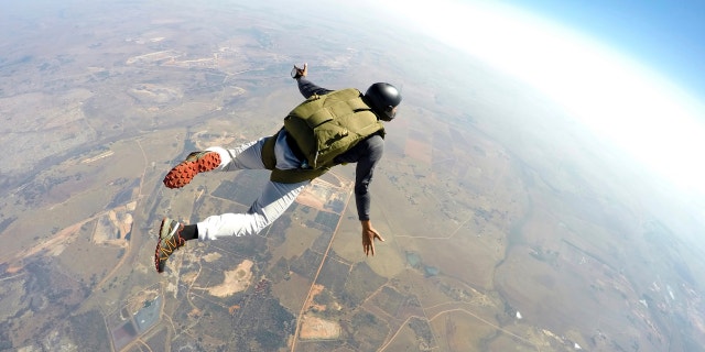 Skydiver flies through the air