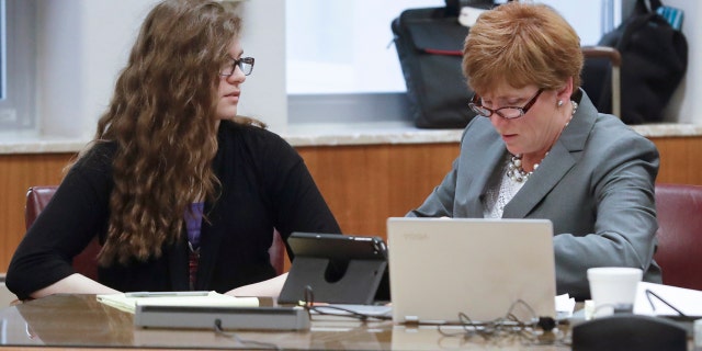 Anissa Weier, left, talks to her attorney Maura McMahon during jury selection.