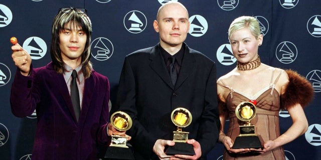 D’arcy Wretzky (right) claims she was not invited to The Smashing Pumpkins reunion.