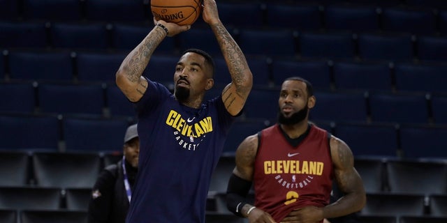 LeBron James was captured by photographers looking frustrated after J.R. Smith's fumble.