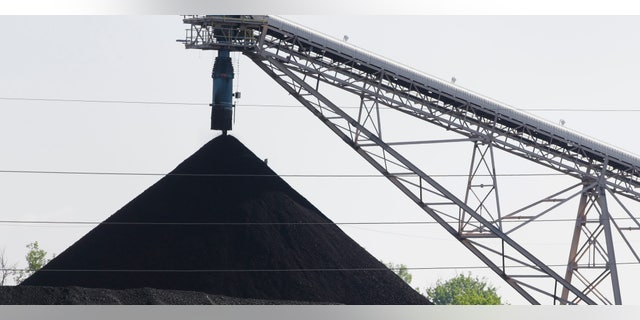 June 2, 2014: A hill of coal is seen at the North Omaha Station, a coal-burning power station, in Omaha, Neb.