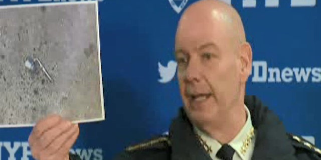 NYPD Chief of Department Terence Monahan at a press conference on Wednesday showing what 911 callers had described as a "silver firearm" that a man was pointing at people on the street.