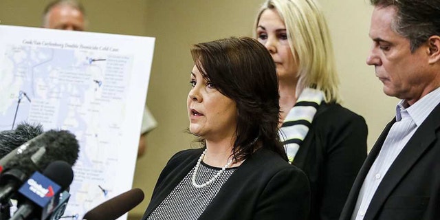 Laura Baanstra, a sister of 1987 homicide victim Jay Cook, speaks at a news conference held, in Everett, Wash. on Wednesday, to release DNA-generated composite images of the suspect.