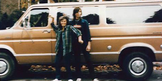 Tanya Van Cuylenborg and Jay Cook with the van they drove to Seattle from British Columbia, a bronze 1977 Ford Club wagon.