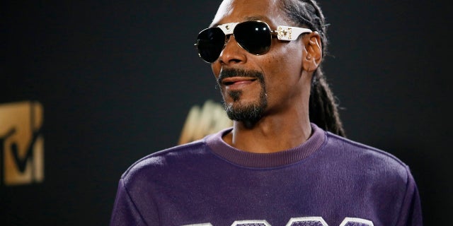 Rapper Snoop Dogg is seen in a video saying, "F--- the President."