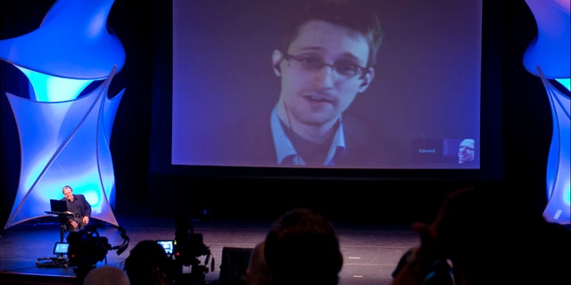 June 5, 2014: Former NSA contractor Edward Snowden participates in a conversation via video with John Perry Barlow, co-founder and vice chairman of the Electronic Frontier Foundation at the 2014 Personal Democracy Forum at New York University in New York.