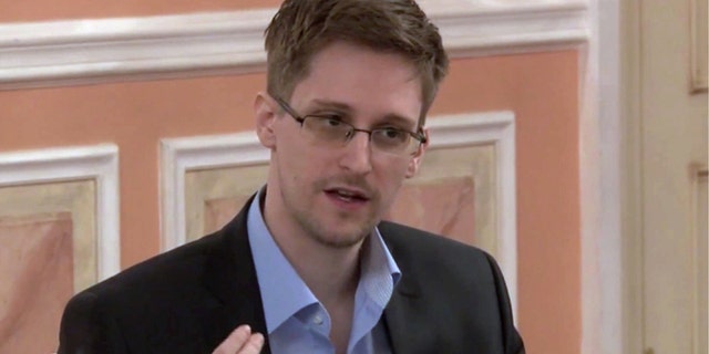 In this undated image made from video released by WikiLeaks, former National Security Agency systems analyst Edward Snowden speaks during a presentation ceremony for the Sam Adams Award in Moscow, Russia.