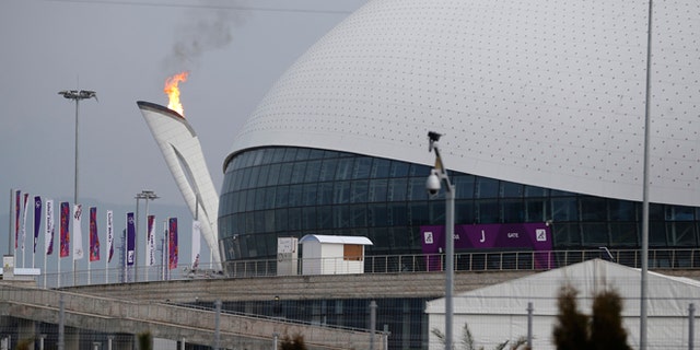Jan. 29, 2014: The Olympic flame is lit during a test next to the Bolshoy Ice Dome before the start of the 2014 Winter Olympics in Sochi, Russia.