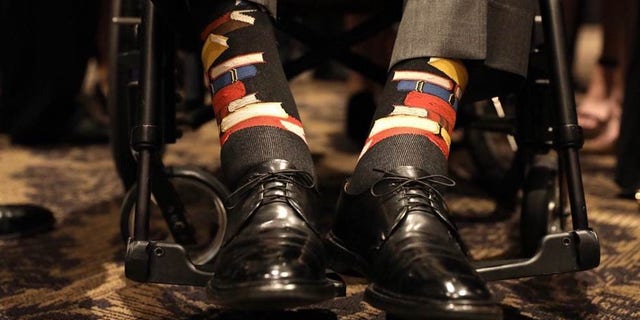 Former President George H.W. Bush wore socks with books stitched on them to honor his late wife's commitment to literacy.