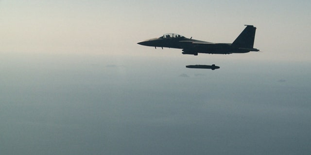 A South Korean air force F-15K fighter jet releases a Taurus missile during a drill off the country's western coast, Sept. 13, 2017.