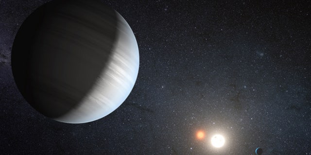 艺术家描绘的外星太阳系开普勒47号，这是一个双星系统，有两个行星。 这些行星有两个太阳，就像“星球大战”宇宙中的虚构行星Tatooine。