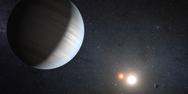艺术家描绘的外星太阳系开普勒47号,这是一个双星系统,有两个行星。 这些行星有两个太阳,就像“星球大战”宇宙中的虚构行星Tatooine。