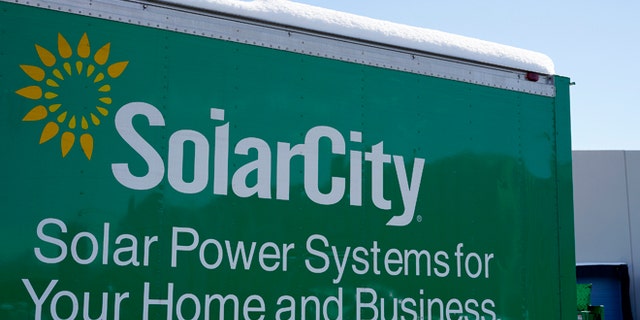 A sign is seen at the SolarCity building in Denver Feb. 17, 2015. (Reuters)