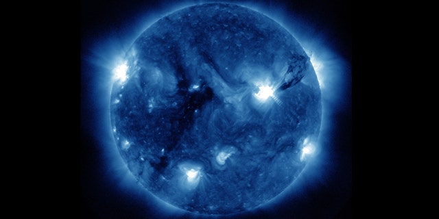 A giant plume of ionized gas called plasma (to the right) leaps off the sun from sunspot 1283 in this photo snapped by NASA's Solar Dynamics Observatory. This sunspot spouted four solar flares and three coronal mass ejections from Sept. 6-8, 2011