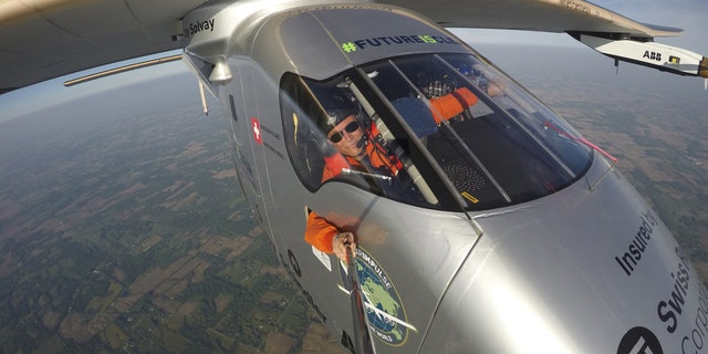 File photo - Bertrand Piccard takes a selfie on board the "Solar Impulse 2" during his flight from Dayton, Ohio to Lehigh Valley International Airport in Allentown, Pa., where he landed, Wednesday, May 25 2016. (Bertrand Piccard/Solar Impulse via AP)