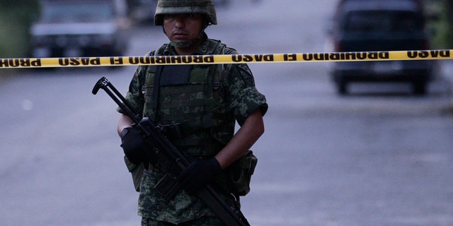 A soldier stands in Ciudad Victoria, in the Mexican state of Tamaulipas