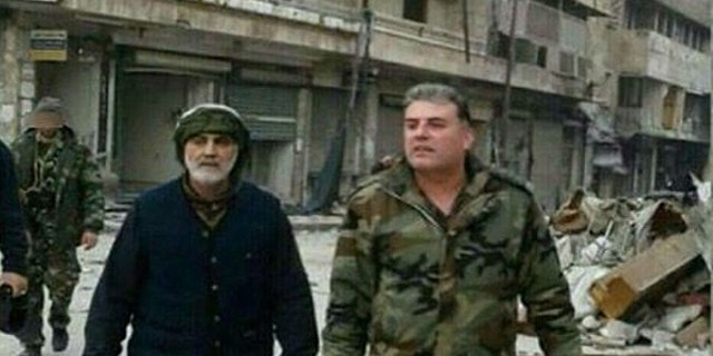 A photo recently surfaced on social media that shows the head of Quds Forces, Qasem Soleimani surveying the streets Aleppo with his Russian counterpart.