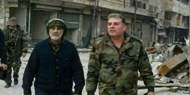 A photo recently surfaced on social media that shows the head of Quds Forces, Qasem Soleimani surveying the streets Aleppo with his Russian counterpart.