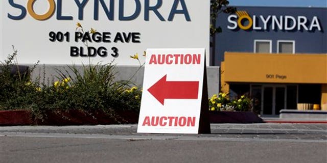 Oct. 31, 2011: An auction sign is shown at bankrupt Solyndra headquarters in Fremont, Calif., before Wednesday's auction. Solyndra received a one half billion dollar loan guarantee from the government before filing for bankruptcy in Sept. 2011.
