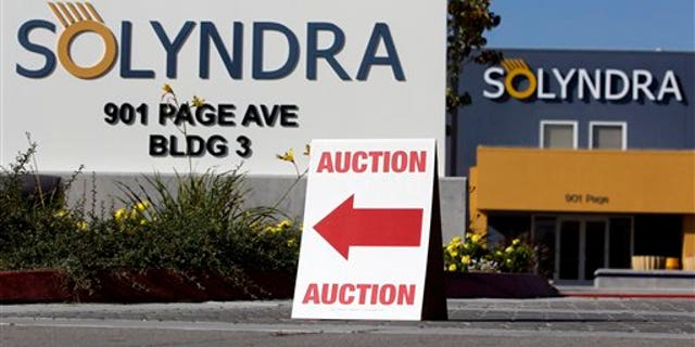 Oct. 31, 2011: An auction sign is shown at bankrupt Solyndra headquarters in Fremont, Calif., before Wednesday's auction. Solyndra received a one half billion dollar loan guarantee from the government before filing for bankruptcy in Sept. 2011.