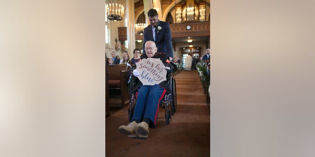 Bill Lee Eblen, 92, was wheeled down the aisle of his niece’s wedding in Cape Girardeau, Missouri, after recovering from an illness.