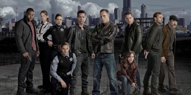Pictured: (l-r) LaRoyce Hawkins as Detective Kevin Atwater, Amy Morton as Sgt. Trudy Platt, Marina Squerciati as Officer Kim Burgess, Brian Geraghty as Officer Sean Roman, Jon Seda as Det. Antonio Dawson, Jason Beghe as Sgt. Hank Voight, Sophia Bush as Det. Erin Lindsay, Jesse Lee Soffer as Det. Jay Halstead, Patrick Flueger as Det. Adam Ruzek, Elias Koteas as Det. Alvin Olinksy.