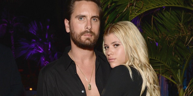 Lionel Richie's daughter Sofia Richie awkwardly answers questions about boyfriend Scott Disick during interview.