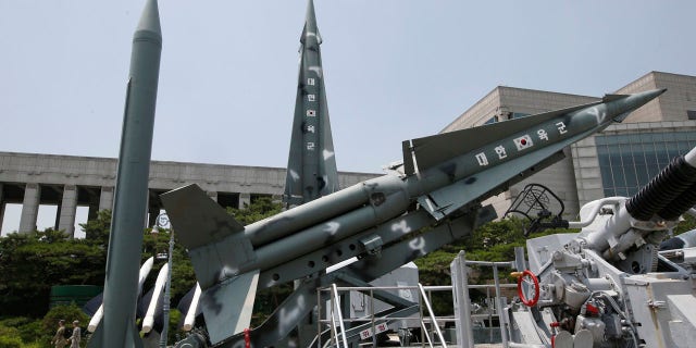July 8, 2016: South Korea's mock missiles are displayed next to North Korea's mock Scud-B, left, at the Korea War Memorial Museum in Seoul.