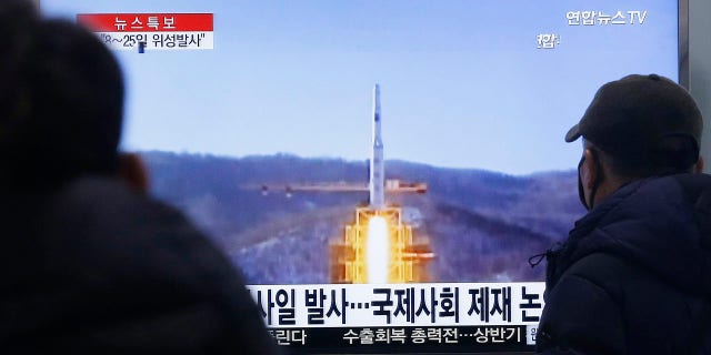 Feb. 3, 2016: South Koreans watch a TV news program with a file footage about North Korea's rocket launch plans at Seoul Railway Station. (AP Photo/Ahn Young-joon)
