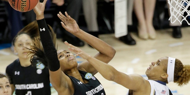 April 5, 2015: South Carolina center Alaina Coates (41) shoots against Notre Dame forward Brianna Turner (11) during the first half of the NCAA Women's Final Four tournament college basketball semifinal game.