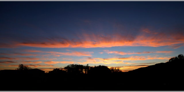 The sun setting over the Pacific Ocean as seen from Los Angeles.