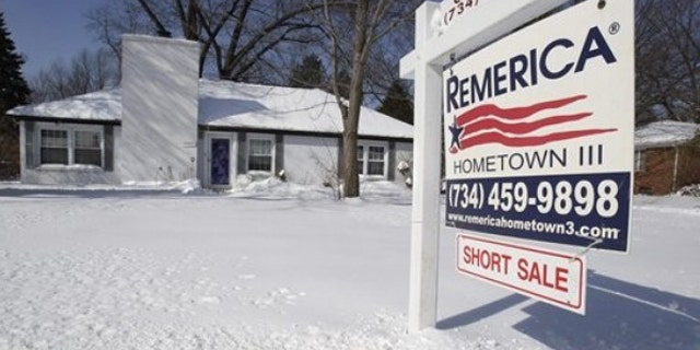 This Feb. 23 picture shows a foreclosed house for sale in the Detroit suburb of Southfield, Mich.