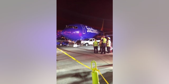 Officials are said to be investigating why a ground vehicle struck the Southwest aircraft on Monday morning.