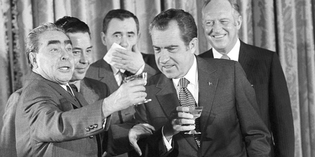 In this June 19, 1973 file photo, Soviet party chief Leonid I. Brezhnev, left, proposes a toast at the State Department in Washington after signing of the U.S.-Soviet cooperative agreements. Others from left, interpreter Viktor Sukhodrev, Russian Foreign Minister Andrei Gromyko, President Nixon and Secretary of State William F. Rogers. Viktor Sukhodrev, the Soviet interpreter who for three decades brought the words of Kremlin leaders to the English-speaking world died in Moscow on Friday May 16, 2014 at the age of 81.