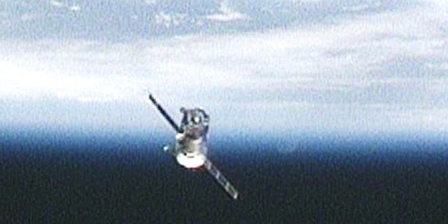 The Soyuz TMA-17 spacecraft carrying Expedition 23 Commander Oleg Kotov and Flight Engineers T.J. Creamer and Soichi Noguchi moves away from the International Space Station after undocking on June 1, 2010 in this view from an exterior station camera.