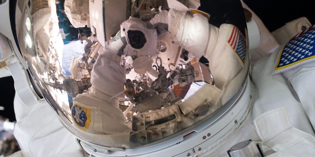 (NASA –Astronaut Scott Kelly takes a selfie during a spacewalk on October 28, 2015)