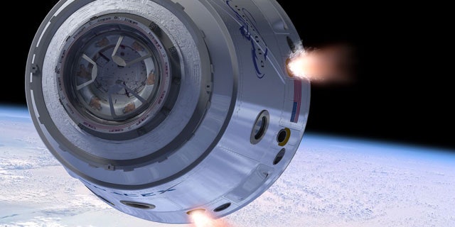 An artist's illustration of SpaceX's Dragon space capsule in Earth orbit.