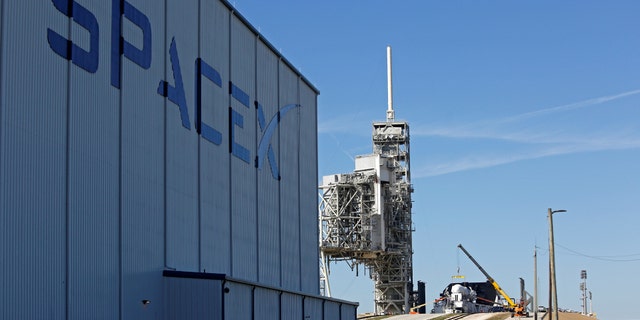 File photo -A SpaceX Falcon 9 rocket (in center, in a horizontal position), is readied for launch on a supply mission to the International Space Station on historic launch pad 39A at the Kennedy Space Center in Cape Canaveral, Florida, U.S., February 17, 2017. (REUTERS/Joe Skipper)