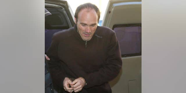 Miguel Ángel Muñoz Blas arriving at the León regional court to stand trial in León, Spain, on Mar. 15, 2017.
