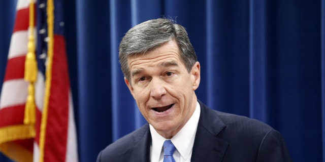 Dec. 15, 2016: Governor-elect Roy Cooper holds a press conference to complain about efforts by Republicans to cut the power of the Governor's office during the special session of the General Assembly that is going on a few blocks away.