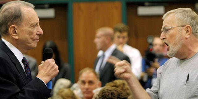 An angry constituent confronts Sen. Arlen Specter at a town hall-style meeting on health care, August, 11, 2009. (AP)