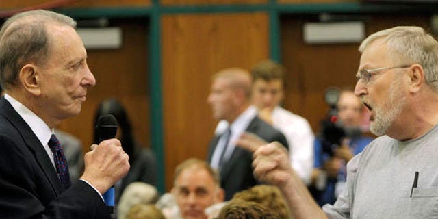 An angry constituent confronts Sen. Arlen Specter at a town hall-style meeting on health care, August, 11, 2009. (AP)