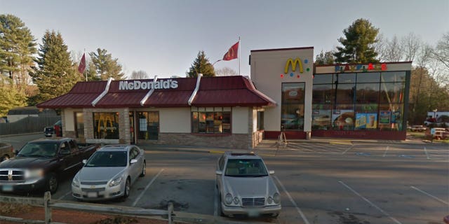 Firefighters responded to McDonald's in Massachusetts after a young girl became stuck in the playground equipment.
