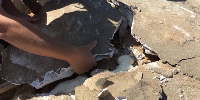 The team works to repair damage from more than nine decades in the desert.