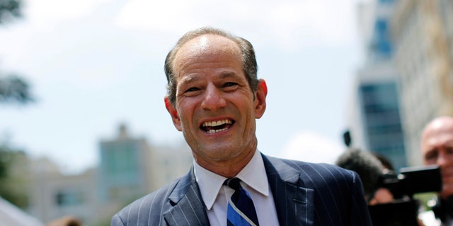 Former New York Governor Eliot Spitzer campaigns in New York, July 8, 2013. REUTERS/Brendan McDermid/File Photo - TM3ECAB0WXS01