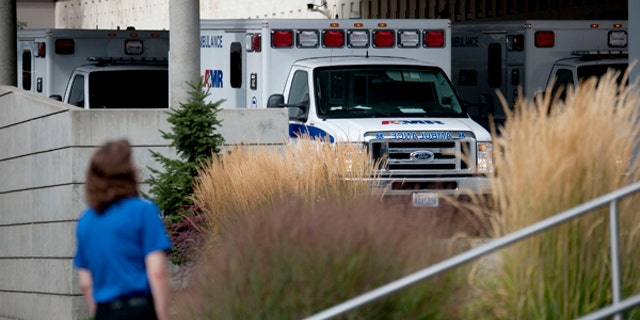 Ambulances line up outside Sacred Heart Hospital following reports of a shooting in Rockford, Wash., Sept. 13, 2017.