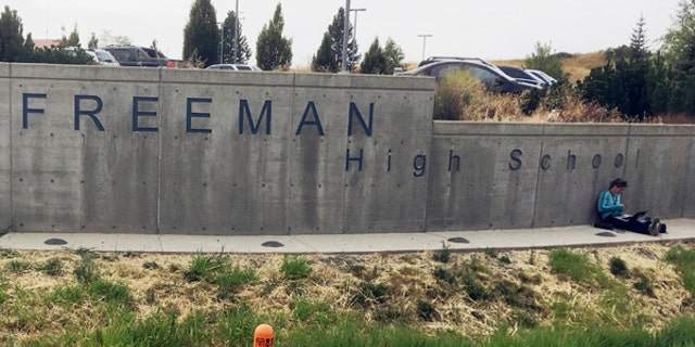 The sign for Freeman High School in Rockford, Wash., is seen outside the campus, Sept. 13, 2017.