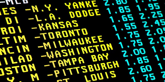 Sight on monitor with the teletext and betting offer of baseball matchups.